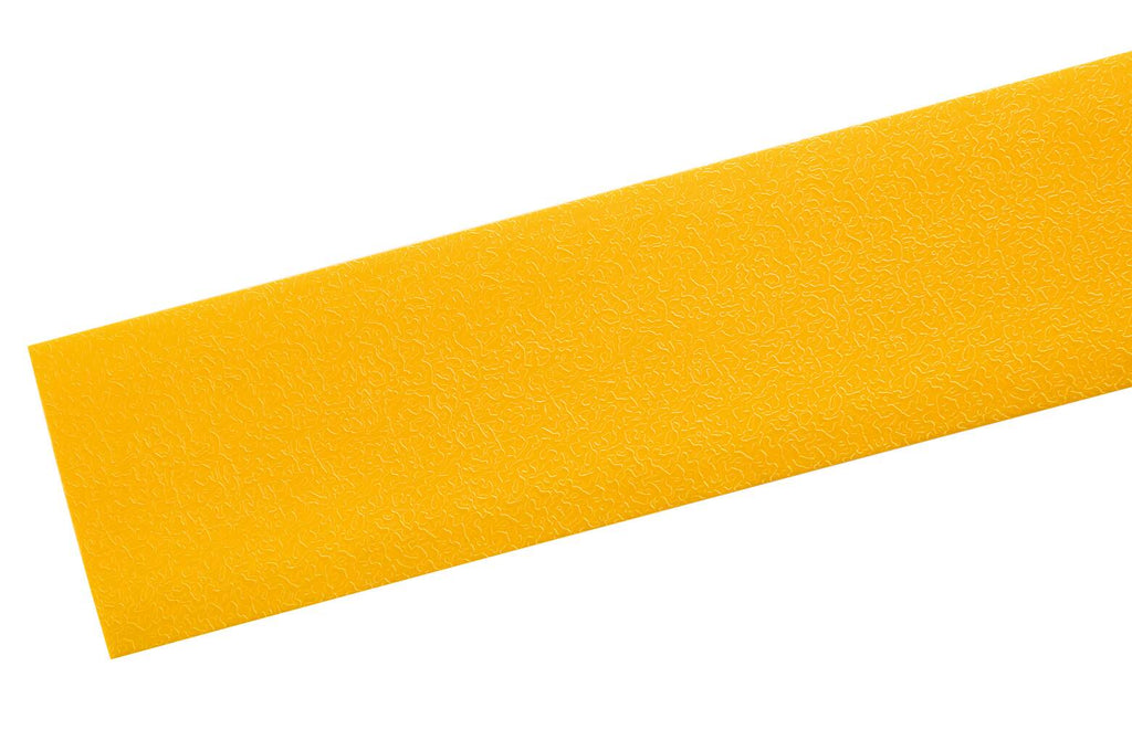 Close view of the textured top surface of yellow DURALINE STRONG floor marking tape