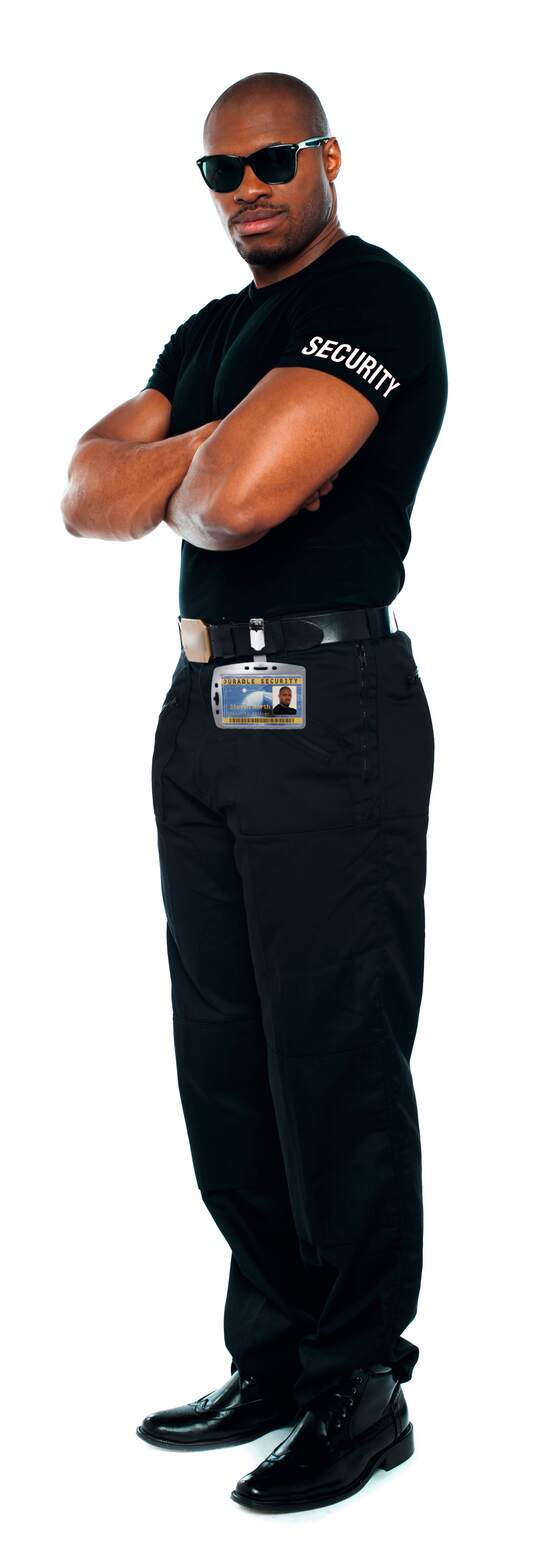 Security officer in a black uniform wearing a clip-on pass holder at the belt