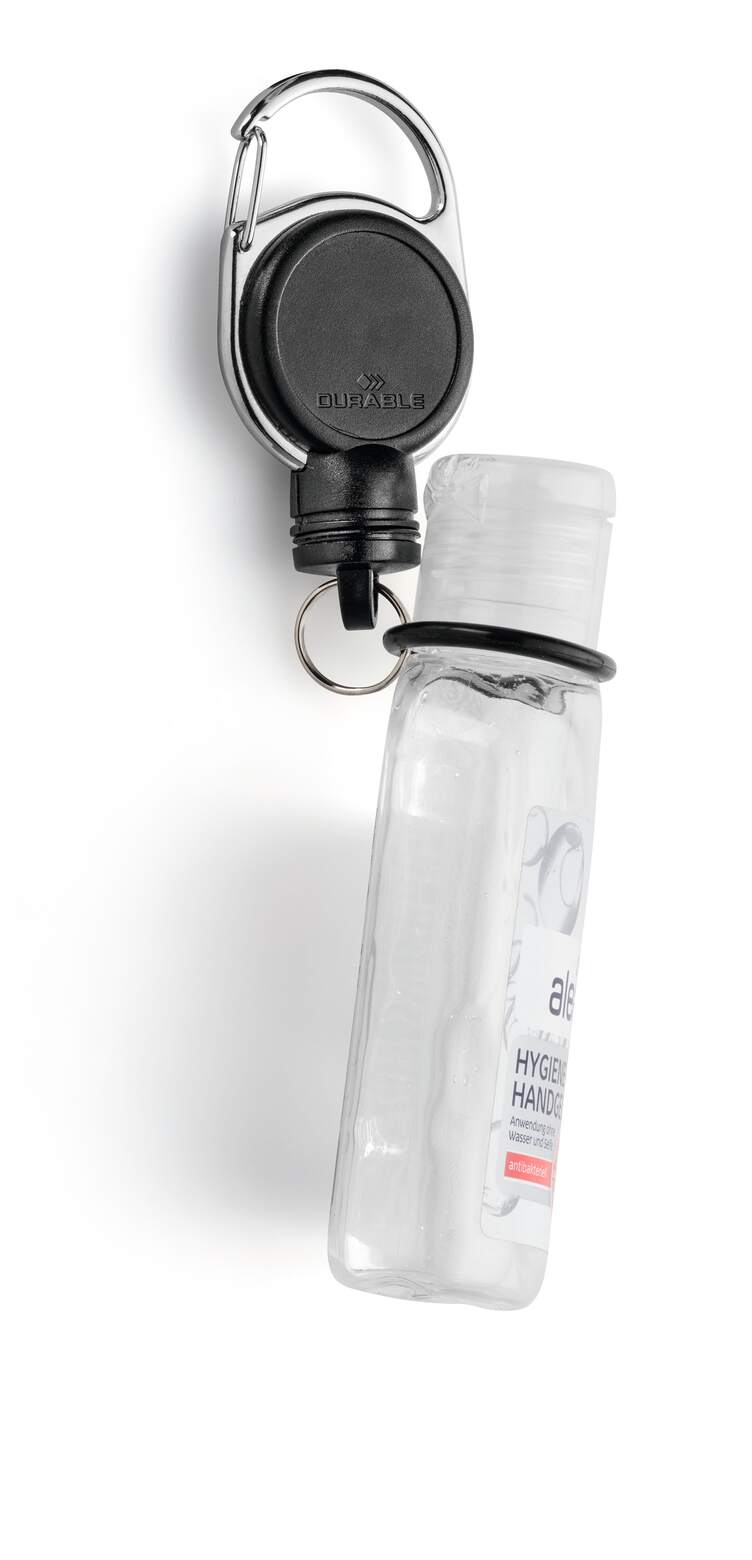 Durable retractable reel holding a small gel bottle by the neck in its rubber O-ring