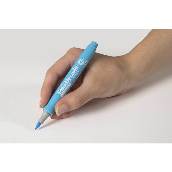Hand writing with an Artline Decorite Brush Pastel Blue marker
