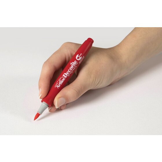 Hand writing with an Artline Decorite Brush Red marker